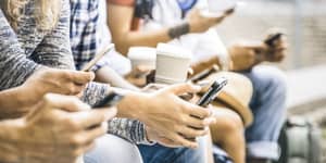 Millennials with phones